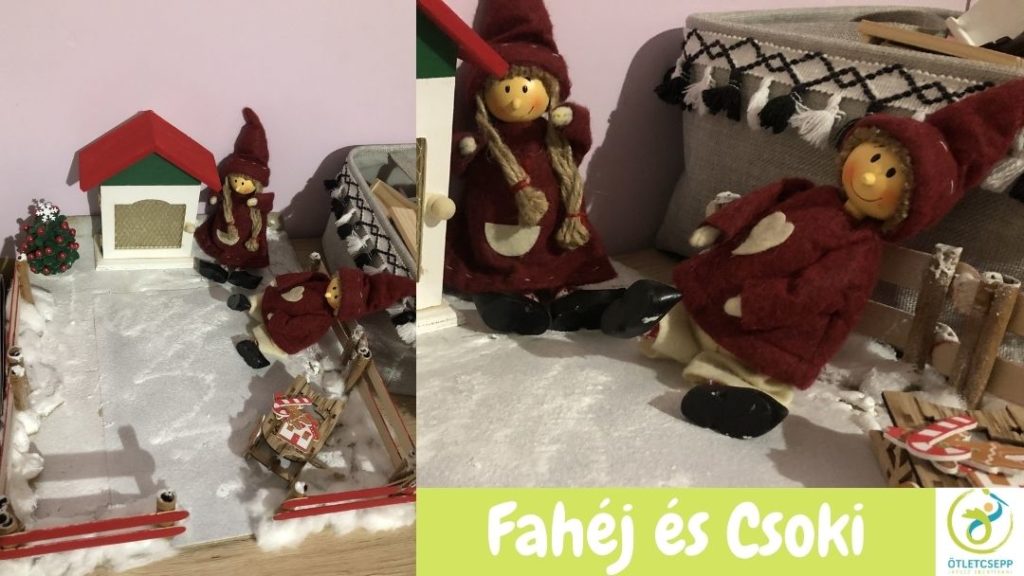 egy lány és egy fiú manó üldögél egy manóajtó mellett
