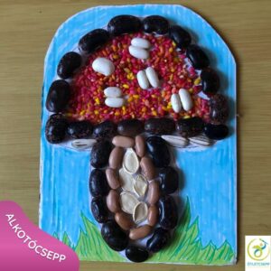 gomba forma babbal, rizzsel, tökmaggal, háttér filccel színezett ég és fűszálak